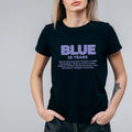 May include: Black t-shirt featuring the word "BLUE" in purple, with "25 YEARS" beneath. A list of UK cities, including Oxford, Birmingham, and Brighton, is printed below. The shirt has a crew neck.